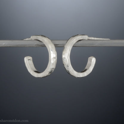 14mm x 2mm small sterling silver hoop earrings, Handmade in North America by Sharon SaintDon. Hammered texture, solid silver with silver posts and backs for men or women, unisex.