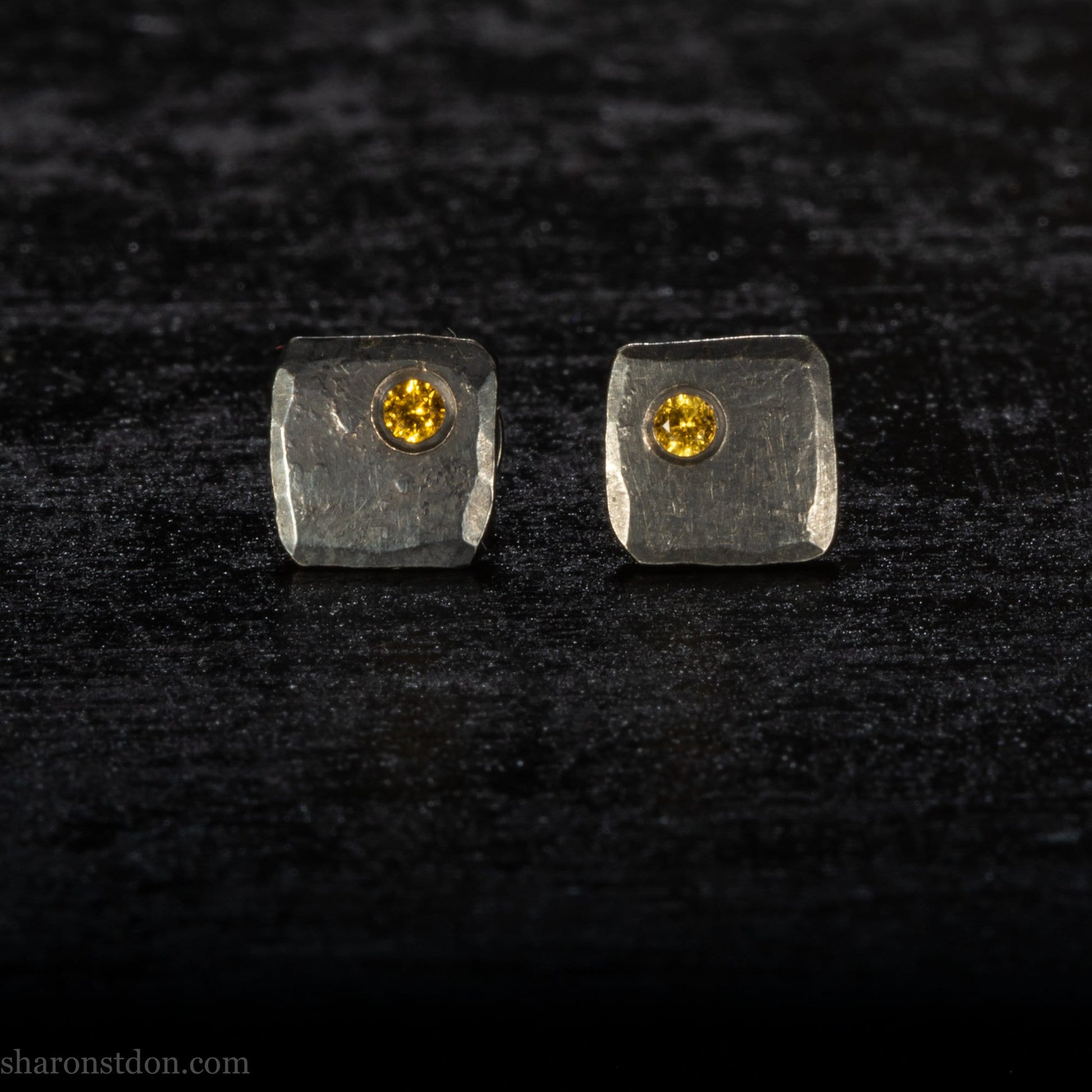 Handmade 925 sterling silver stud earrings with lab grown golden yellow topaz gemstones. Oxidized black 925 sterling silver small squares made by Sharon SaintDon in North America.