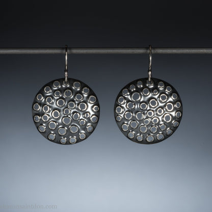 Handmade 925 sterling silver dangle earrings for women. Round disc earrings with perforated holes made by Sharon SaintDon in North America.