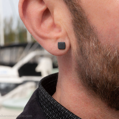 Handmade 925 sterling silver stud earrings.  Small hammered, textured squares. Minimalist, oxidized black stud earrings for men or women made by Sharon SaintDon in North America.