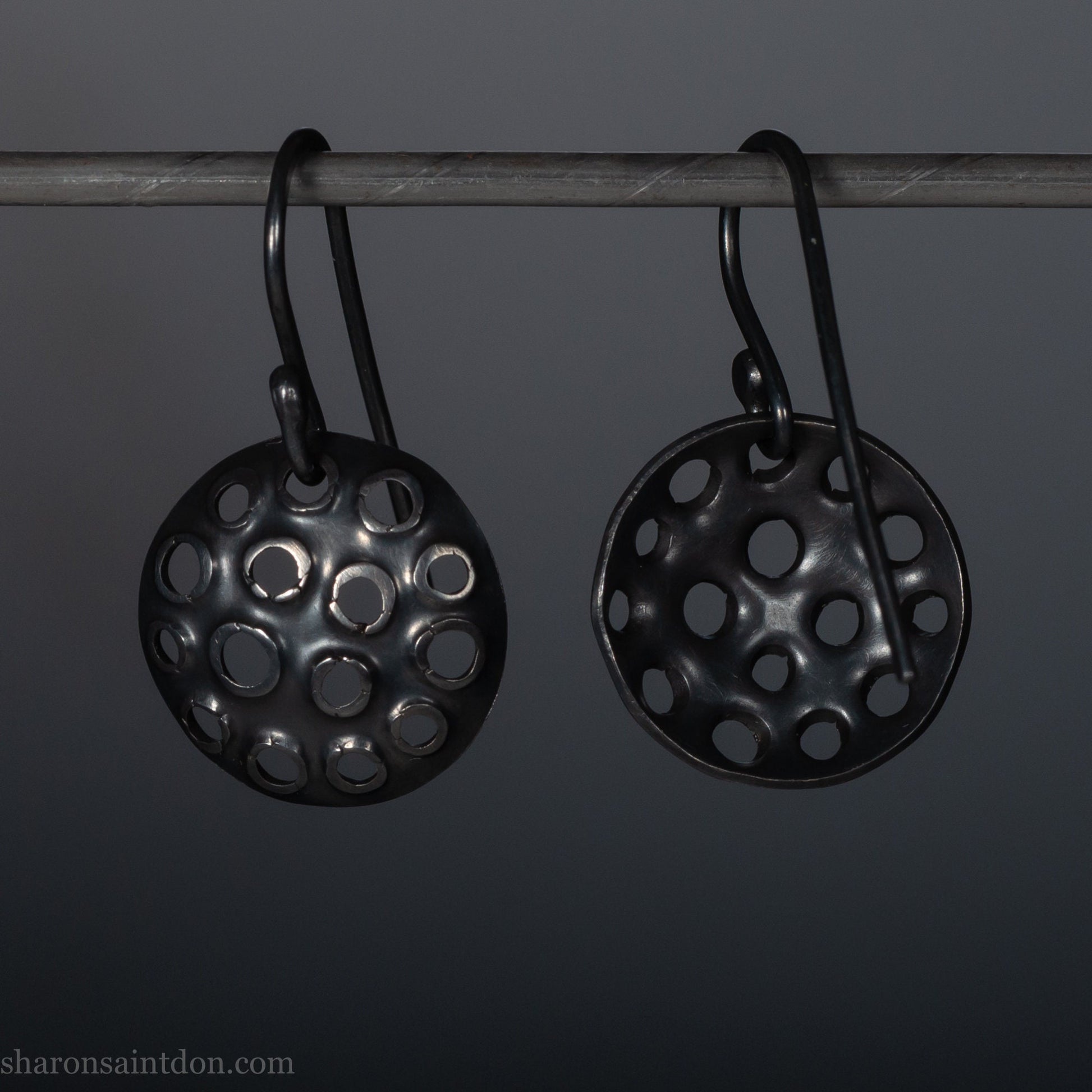 Handmade 925 sterling silver earrings. Oxidized black dangle round discs made by Sharon SaintDon in North America.