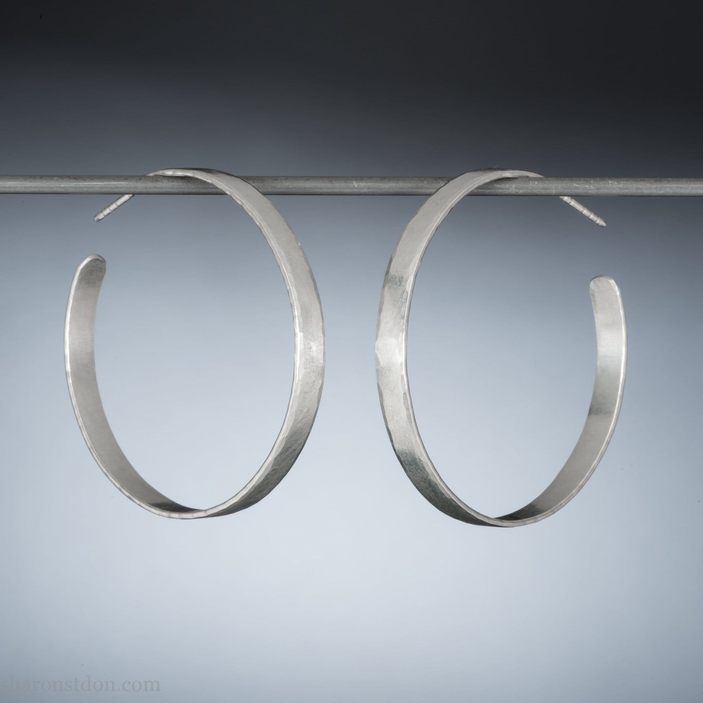 Handmade 925 sterling silver hoop earrings. Comfortable, lightweight, daily wear earrings made by Sharon SaintDon in North America.