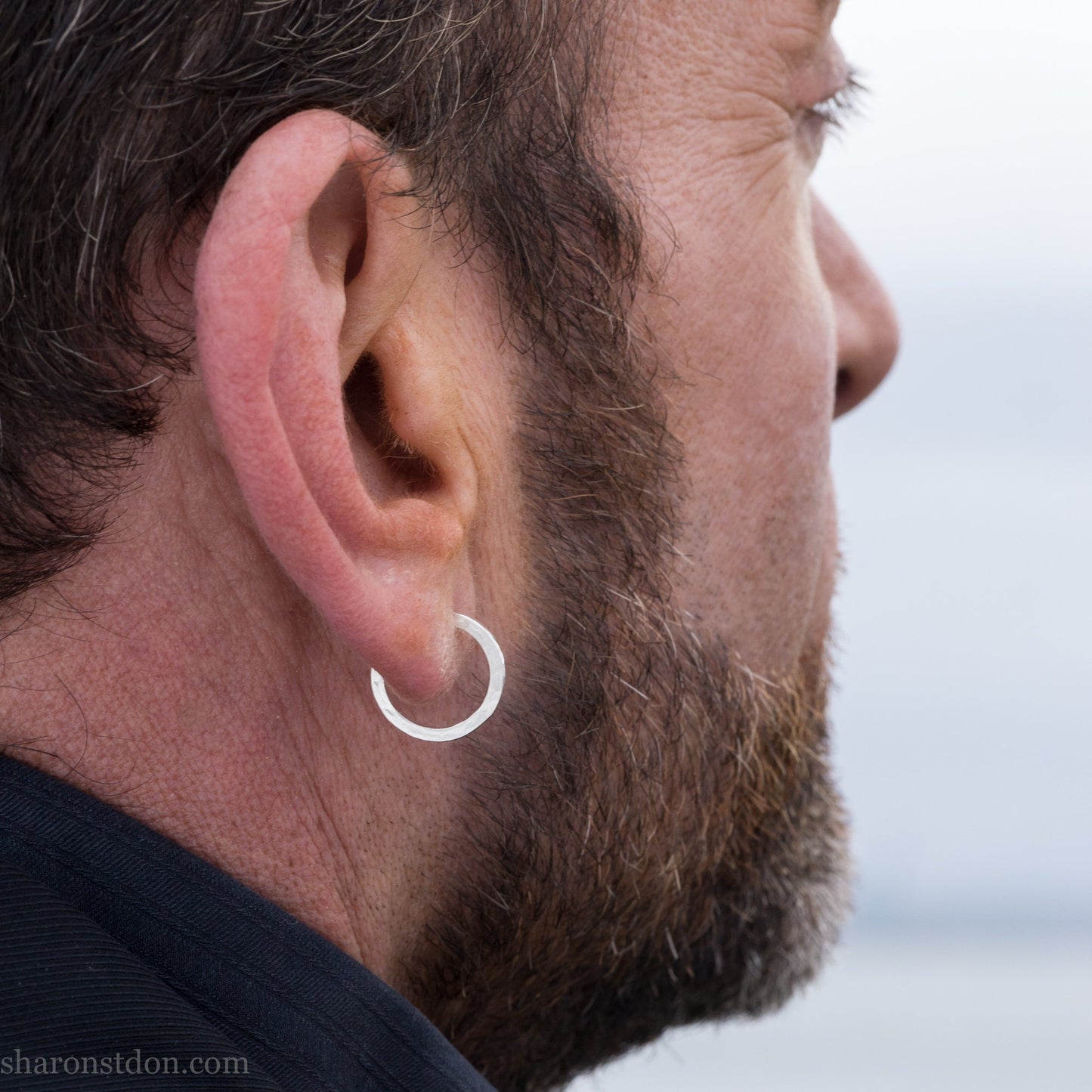 Small sterling silver hoop earrings, 16mm diameter, 2mm wide, hammered solid silver with brushed matte finish, sterling silver posts and backs.