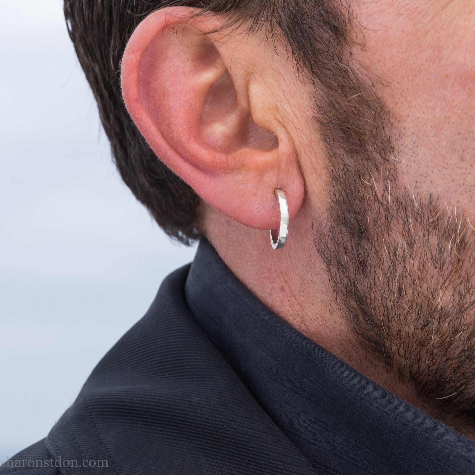 Small sterling silver hoop earrings, 16mm diameter, 2mm wide, hammered solid silver with brushed matte finish, sterling silver posts and backs.