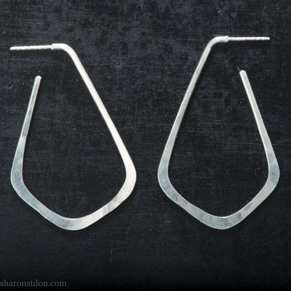 Sterling silver teardrop elongated shape hoop earrings, hammered matte finish, 50x32mm.